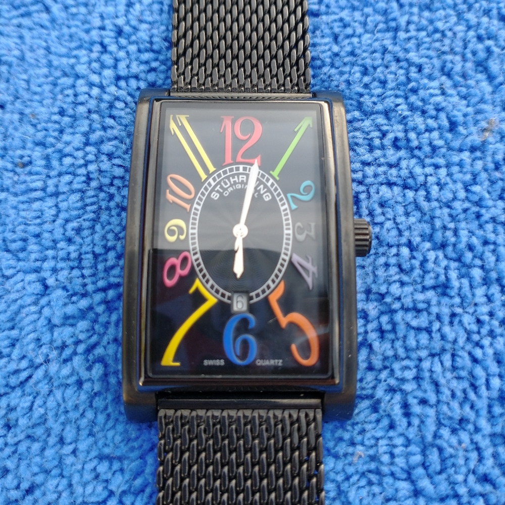 Stuhrling watch men's brand new with tags in box sold as is not working
